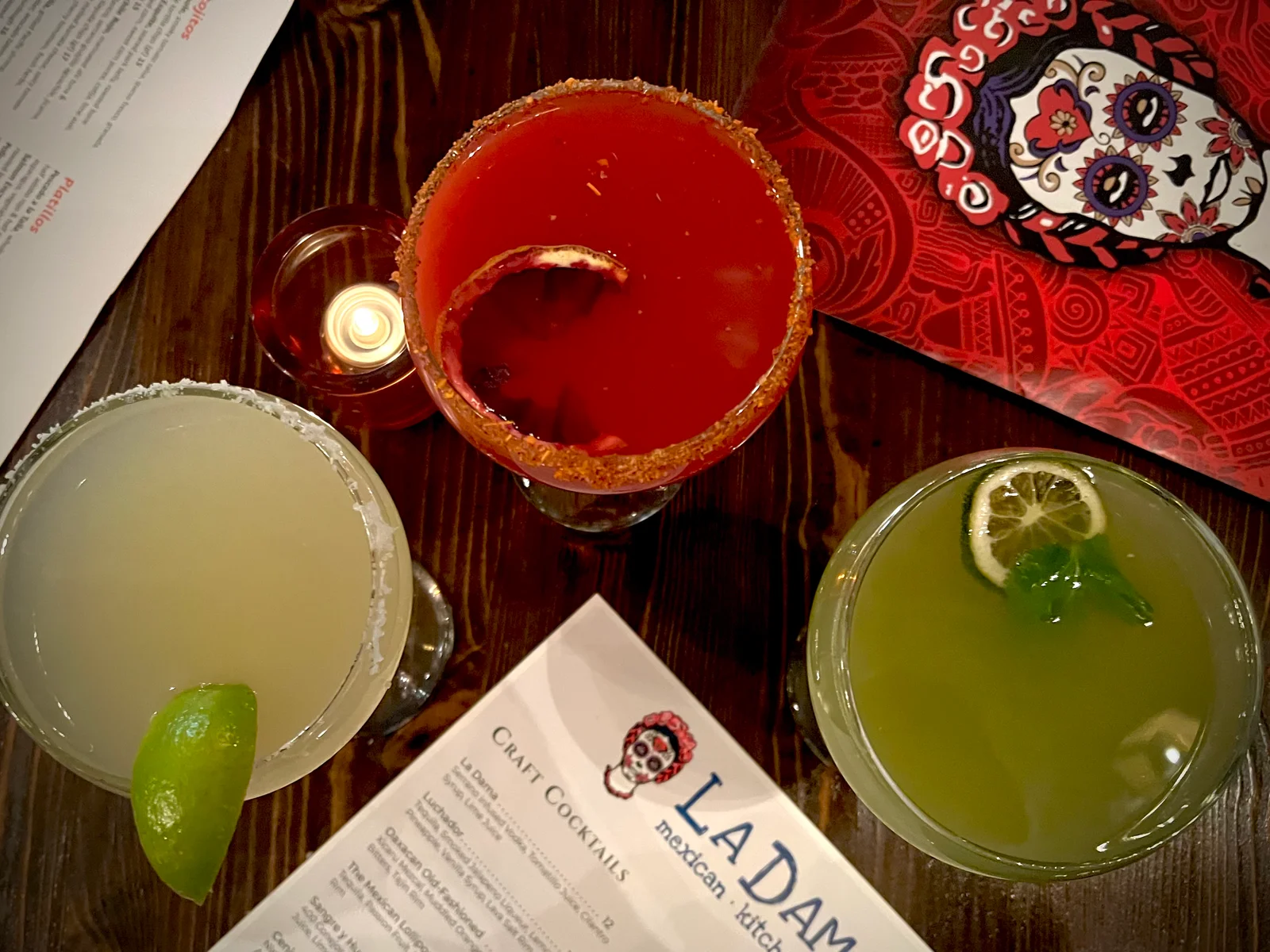 From left to right: Margarita, Sangre y Humo, and La Dama cocktails.